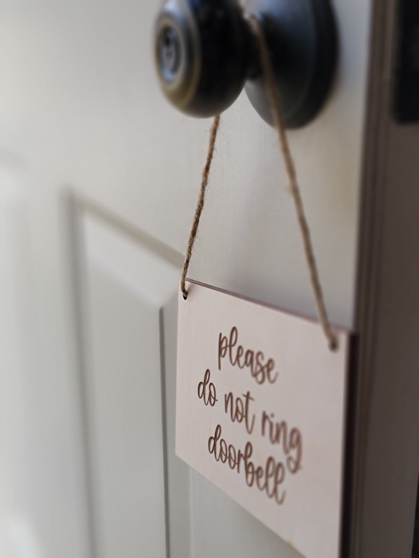 Please do not ring doorbell sign